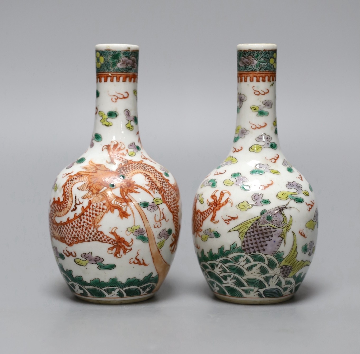 A pair of Chinese enamelled porcelain ‘dragon’ bottle vases, Kangxi marks probably Guangxu period, 15cms high